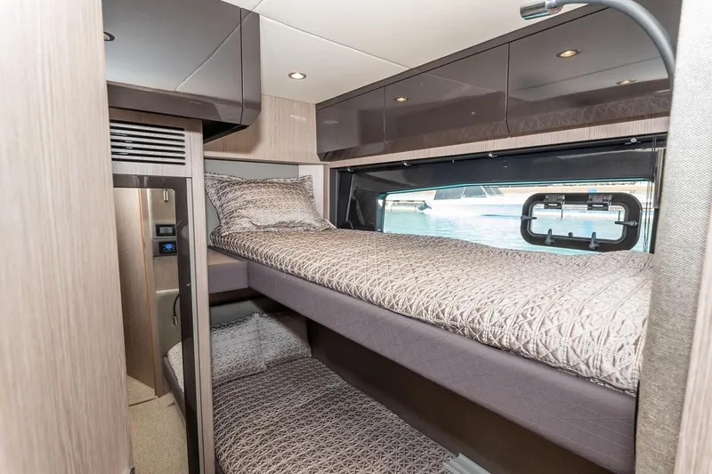 Rogue 33 Yacht Photos Pics 2019 Azimut Atlantis 51 yacht interior with bunk beds and modern design.