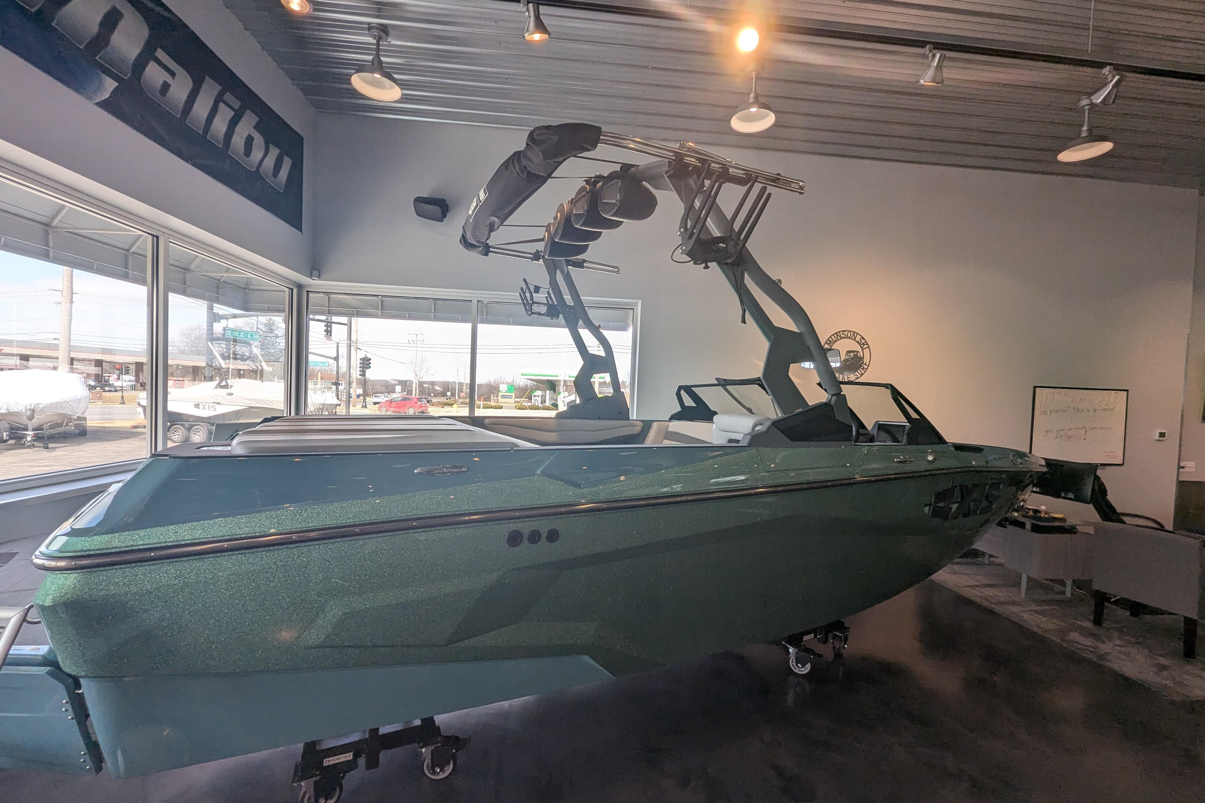 2026 Axis A200 boat displayed indoors with sleek design and modern features.