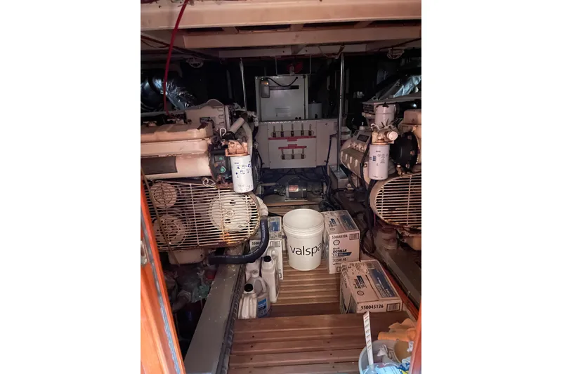 Daddy's Dream Yacht Photos Pics Engine room of 1991 Grand Banks 46 Motoryacht with equipment and supplies.