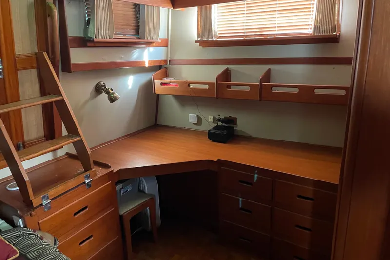 Daddy's Dream Yacht Photos Pics 1991 Grand Banks 46 Motoryacht interior with wooden desk and storage drawers.