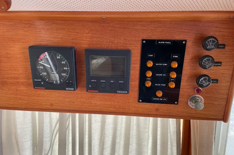 Daddy's Dream Yacht Photos Pics Control panel of a 1991 Grand Banks 46 Motoryacht with gauges and switches.