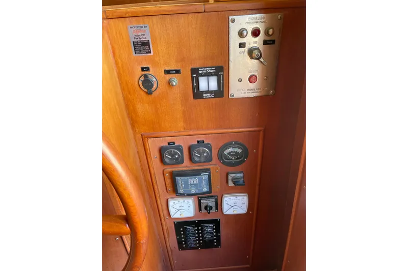 Daddy's Dream Yacht Photos Pics Control panel of 1991 Grand Banks 46 Motoryacht with gauges and switches.