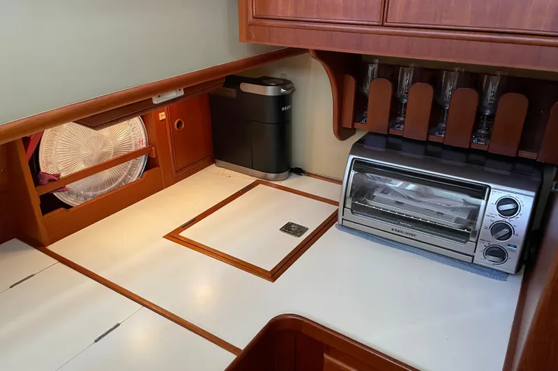 Daddy's Dream Yacht Photos Pics Galley kitchen in 1991 Grand Banks 46 Motoryacht with toaster oven and coffee maker.