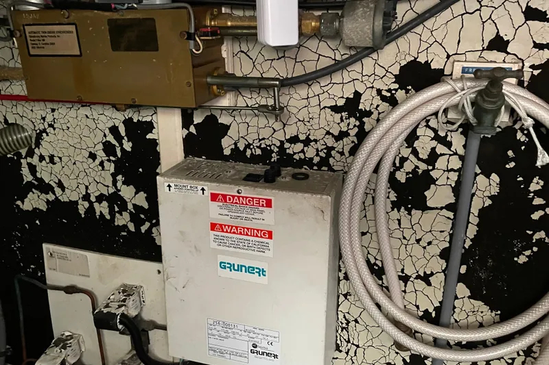 Daddy's Dream Yacht Photos Pics Electrical panel and wiring inside a 1991 Grand Banks 46 Motoryacht engine room.