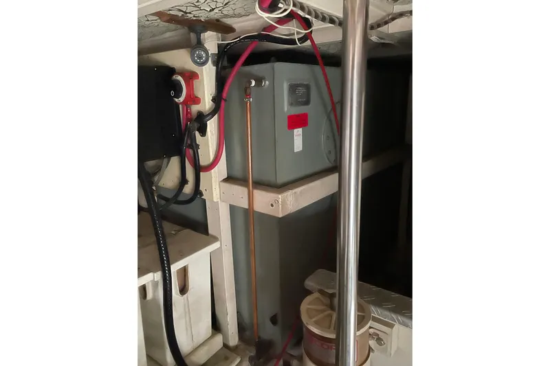 Daddy's Dream Yacht Photos Pics Engine room of 1991 Grand Banks 46 Motoryacht with electrical and plumbing components.