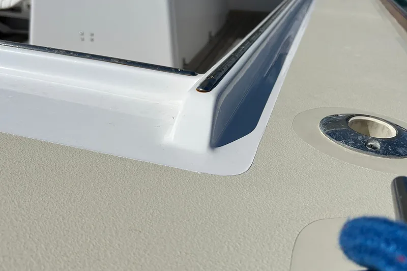 Nellie Yacht Photos Pics Close-up of 1995 Holland Pettegrow Cruiser deck detail with metal fittings.