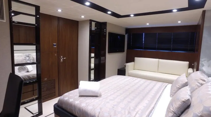  Yacht Photos Pics Luxurious bedroom interior of 2014 Fairline Squadron 78 Custom yacht with modern decor.