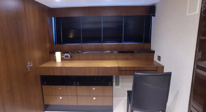  Yacht Photos Pics Luxurious wooden desk area in 2014 Fairline Squadron 78 Custom yacht.