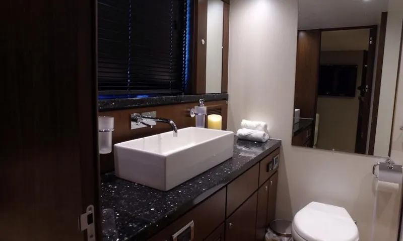  Yacht Photos Pics Luxurious bathroom in 2014 Fairline Squadron 78 Custom yacht with modern fixtures.