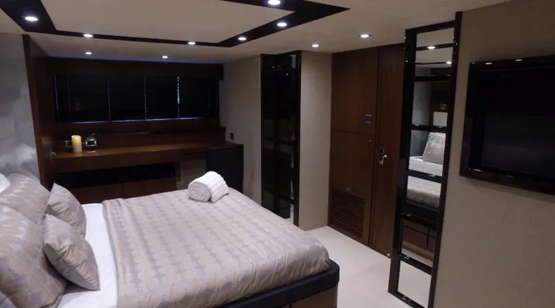  Yacht Photos Pics Luxurious bedroom interior of 2014 Fairline Squadron 78 Custom yacht.