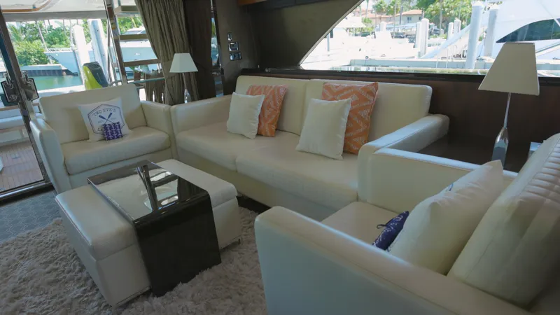  Yacht Photos Pics Luxurious interior of 2014 Fairline Squadron 78 Custom yacht with elegant white seating.