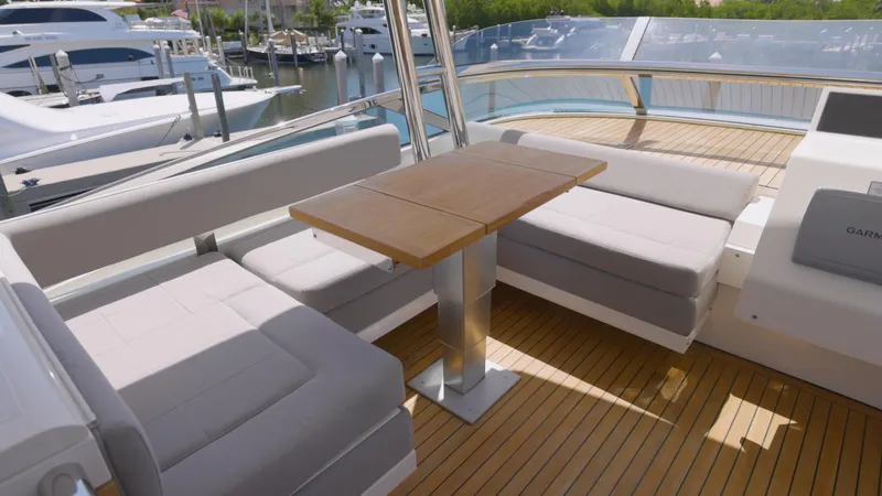  Yacht Photos Pics Luxurious 2014 Fairline Squadron 78 Custom yacht with elegant seating and wooden deck.