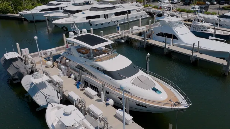  Yacht Photos Pics 2014 Fairline Squadron 78 Custom yacht docked at marina with other luxury boats.