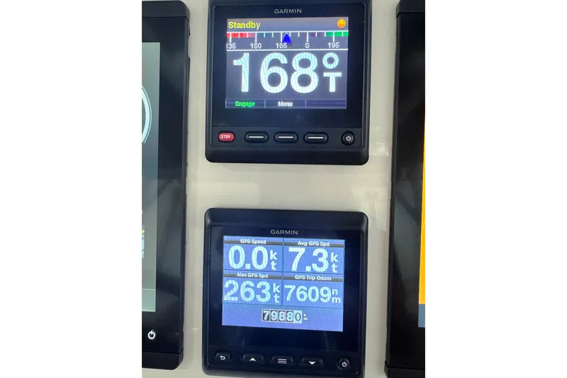 T/t Jodi Ann Yacht Photos Pics Garmin navigation displays on 2019 Intrepid 345 Nomad FE showing speed and heading data.