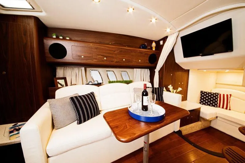  Yacht Photos Pics Manufacturer Provided Image: Luxurious interior of 2017 Rinker EX 370 yacht with cozy seating and modern amenities.