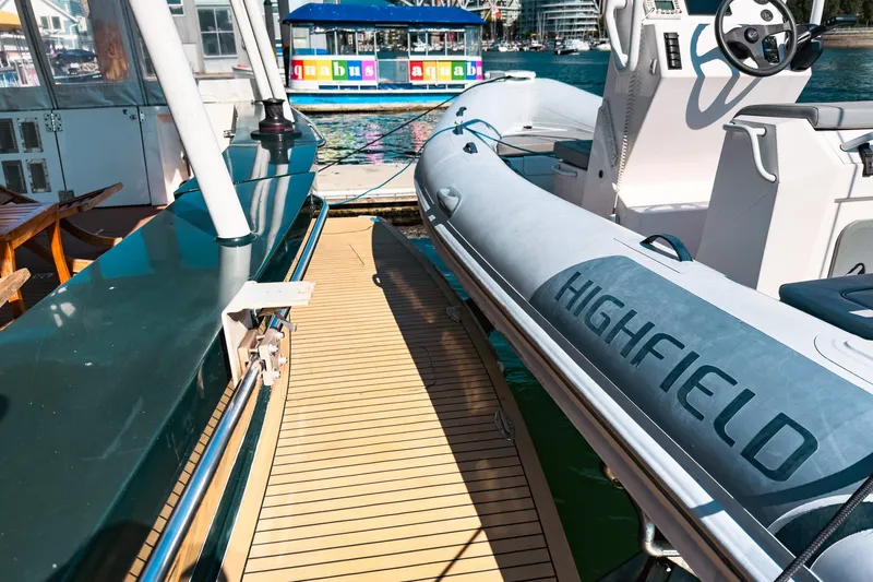 North Yacht Photos Pics Side view of 2002 Darling Yachts Custom Aluminum with Highfield inflatable boat.