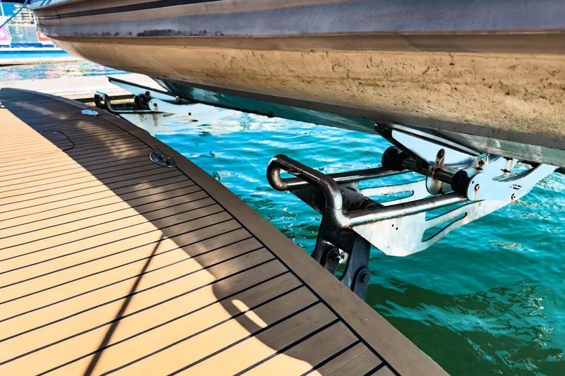 North Yacht Photos Pics Close-up of 2002 Darling Yachts Custom Aluminum boat deck and water.