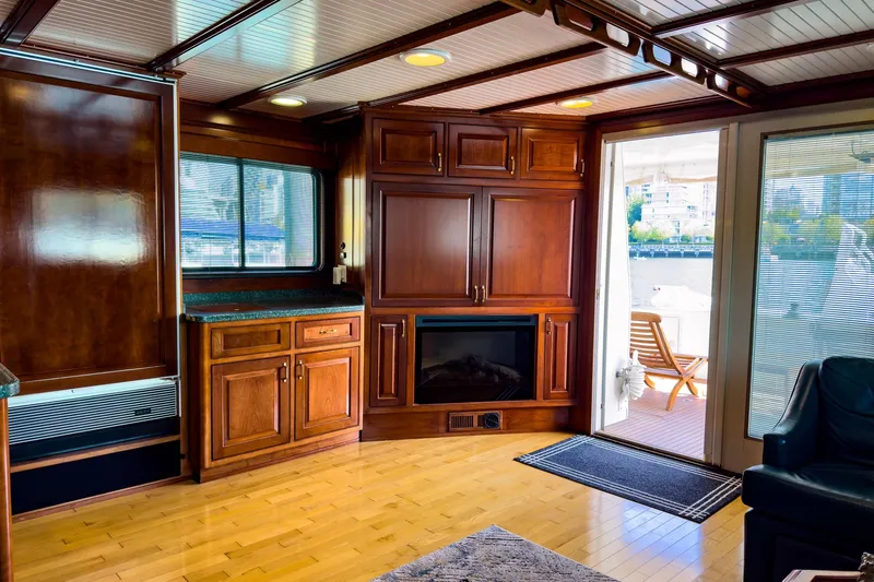 North Yacht Photos Pics Luxurious 2002 Darling Yachts Custom Aluminum interior with wood cabinetry and waterfront view.