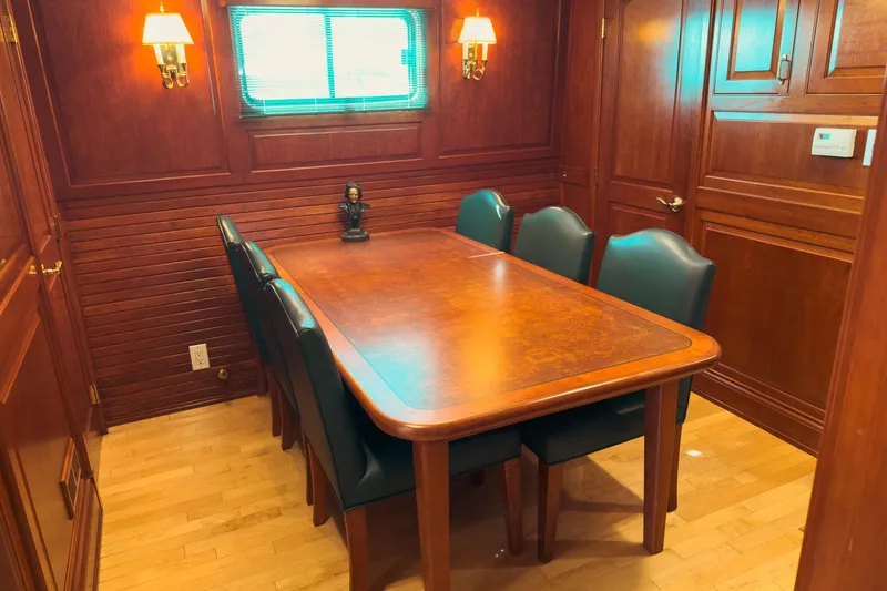 North Yacht Photos Pics Luxurious wooden dining area on 2002 Darling Yachts Custom Aluminum.
