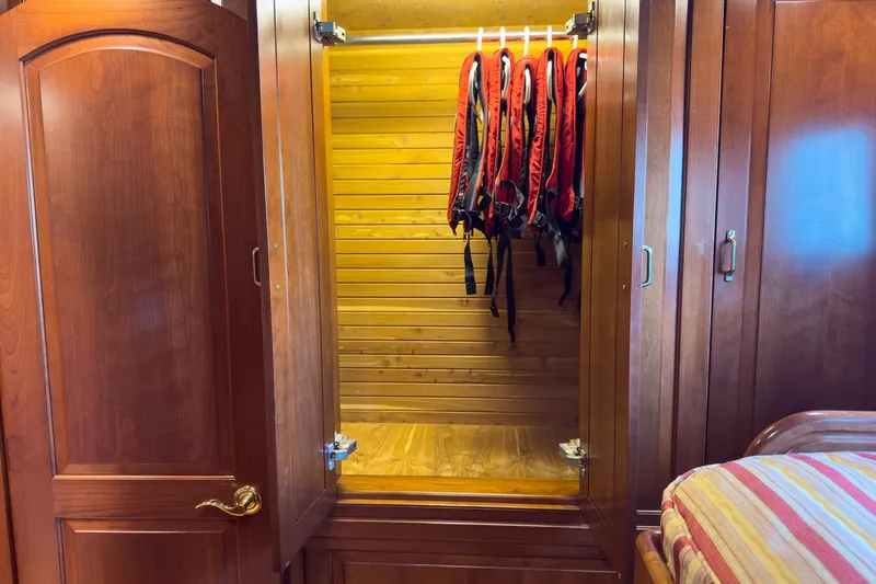 North Yacht Photos Pics Wooden yacht closet with life jackets, Darling Yachts Custom Aluminum, 2002 model.
