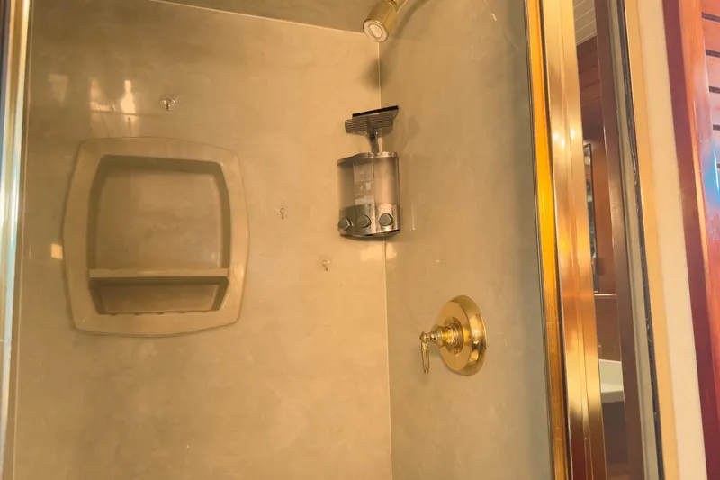 North Yacht Photos Pics Shower area in 2002 Darling Yachts Custom Aluminum yacht with gold fixtures.