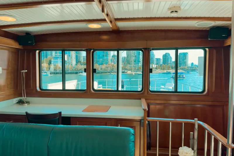 North Yacht Photos Pics Interior of 2002 Darling Yachts Custom Aluminum, featuring large windows with waterfront view.