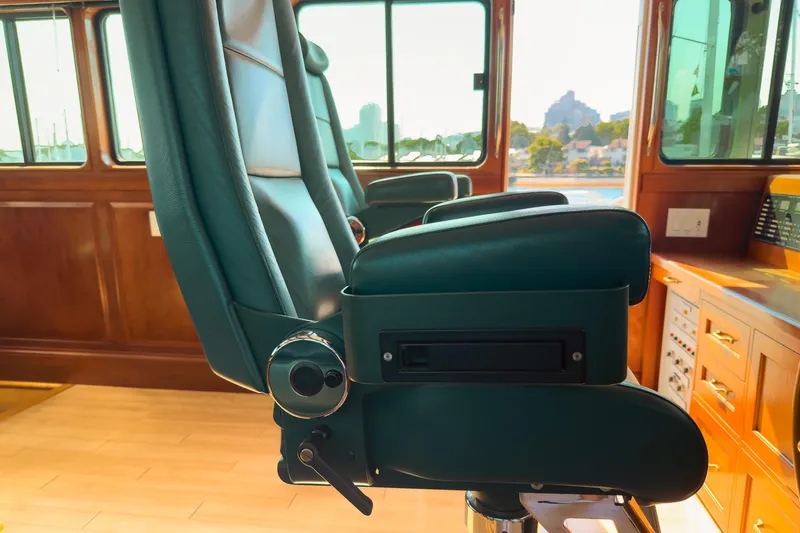 North Yacht Photos Pics Luxurious interior of 2002 Darling Yachts Custom Aluminum, featuring plush seating and wooden accents.