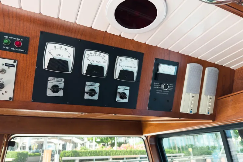 North Yacht Photos Pics Control panel of 2002 Darling Yachts Custom Aluminum, featuring gauges and switches.