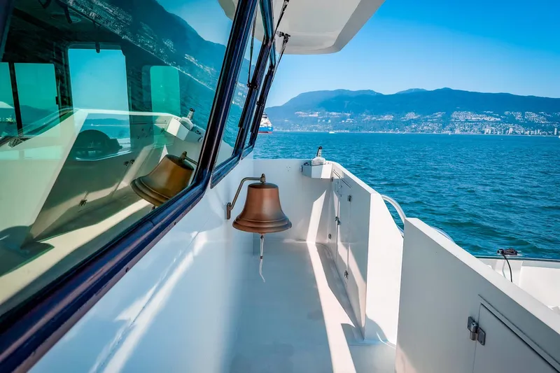 North Yacht Photos Pics 2002 Darling Yachts Custom Aluminum boat with scenic ocean and mountain view.