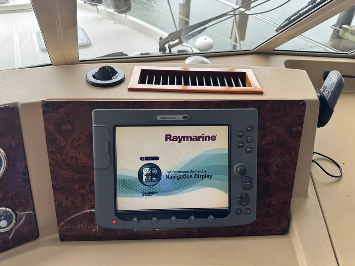  Yacht Photos Pics Raymarine navigation display on 2005 Meridian 490 Pilothouse boat dashboard.