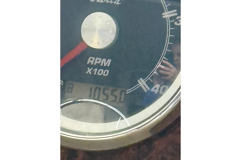  Yacht Photos Pics Close-up of a 2005 Meridian 490 Pilothouse RPM gauge displaying 1055.
