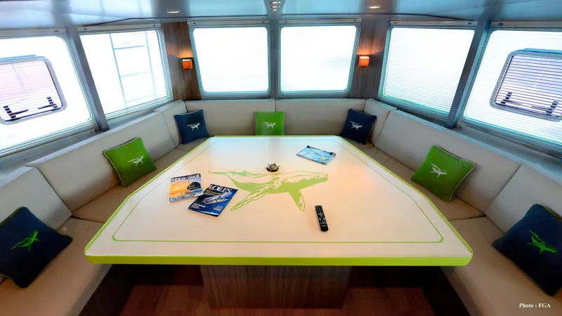 Adventure Yacht Photos Pics Luxurious Squalt Marine CK 64 yacht interior with modern seating and decorative pillows, 2019 model.