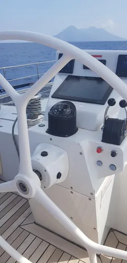 Adventure Yacht Photos Pics Steering wheel and controls of 2019 Squalt Marine CK 64 yacht.