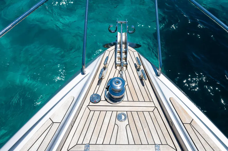 Polar Yacht Photos Pics Bow of 2023 Pershing 5x yacht on clear turquoise water.