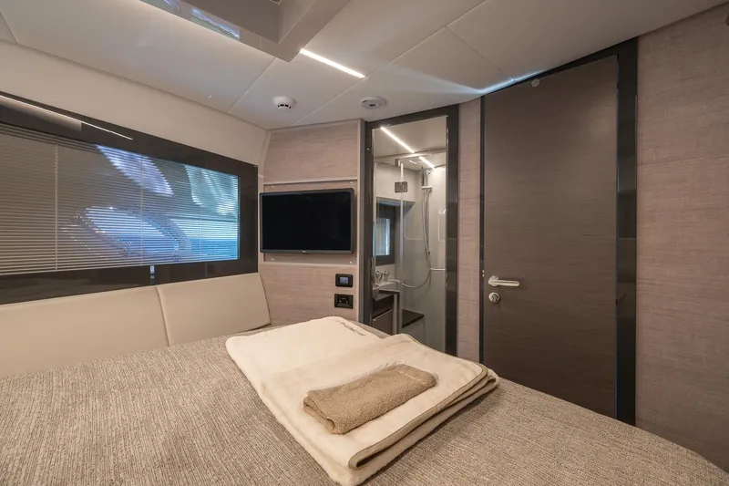 Polar Yacht Photos Pics Luxurious 2023 Pershing 5x yacht cabin with modern design and cozy bedding.
