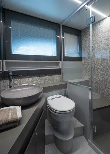 Polar Yacht Photos Pics Luxurious bathroom in 2023 Pershing 5x yacht with modern fixtures and sleek design.