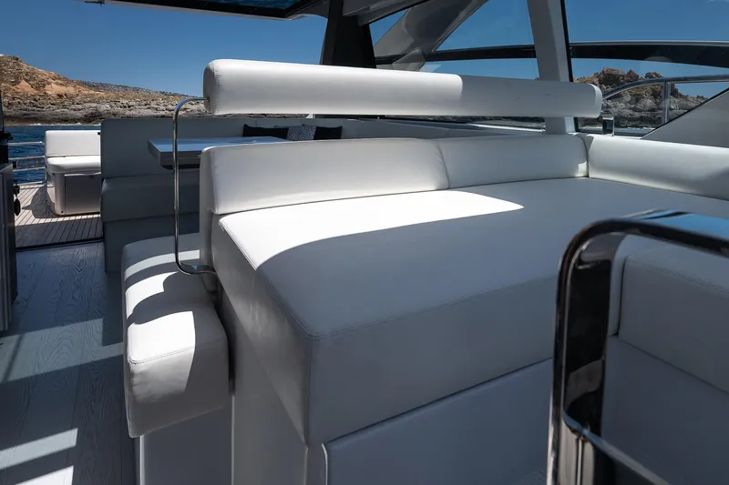 Polar Yacht Photos Pics 2023 Pershing 5x yacht interior with sleek white seating and modern design.