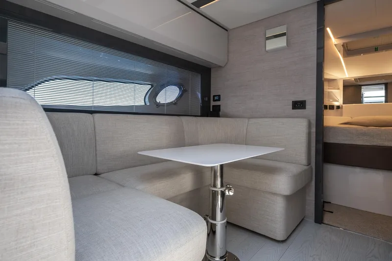 Polar Yacht Photos Pics 2023 Pershing 5x yacht interior with modern seating and table.