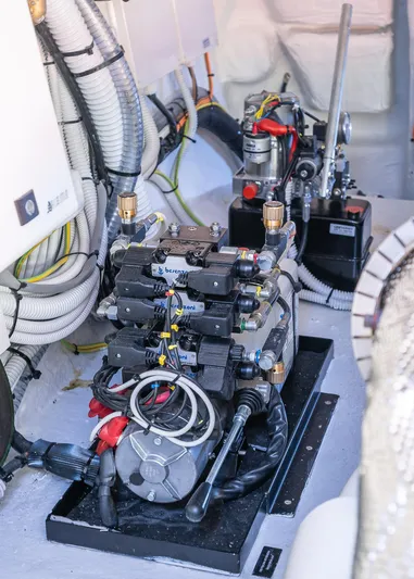 Polar Yacht Photos Pics Engine room of 2023 Pershing 5x yacht, showcasing mechanical components and wiring.