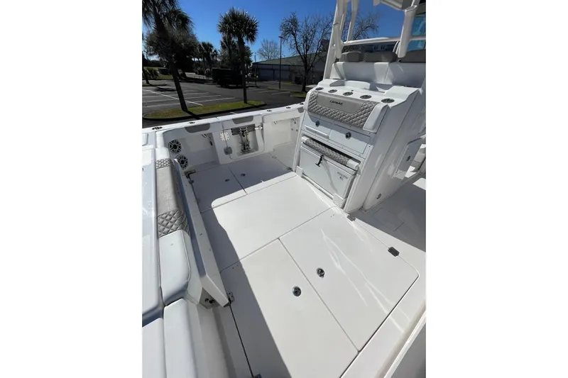  Yacht Photos Pics 2024 Caymas 34 CT boat interior with seating and storage compartments.