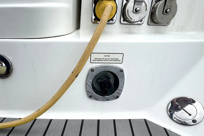 Blue Skye Yacht Photos Pics 2016 Formula 34 Performance Cruiser water and waste connections on deck.