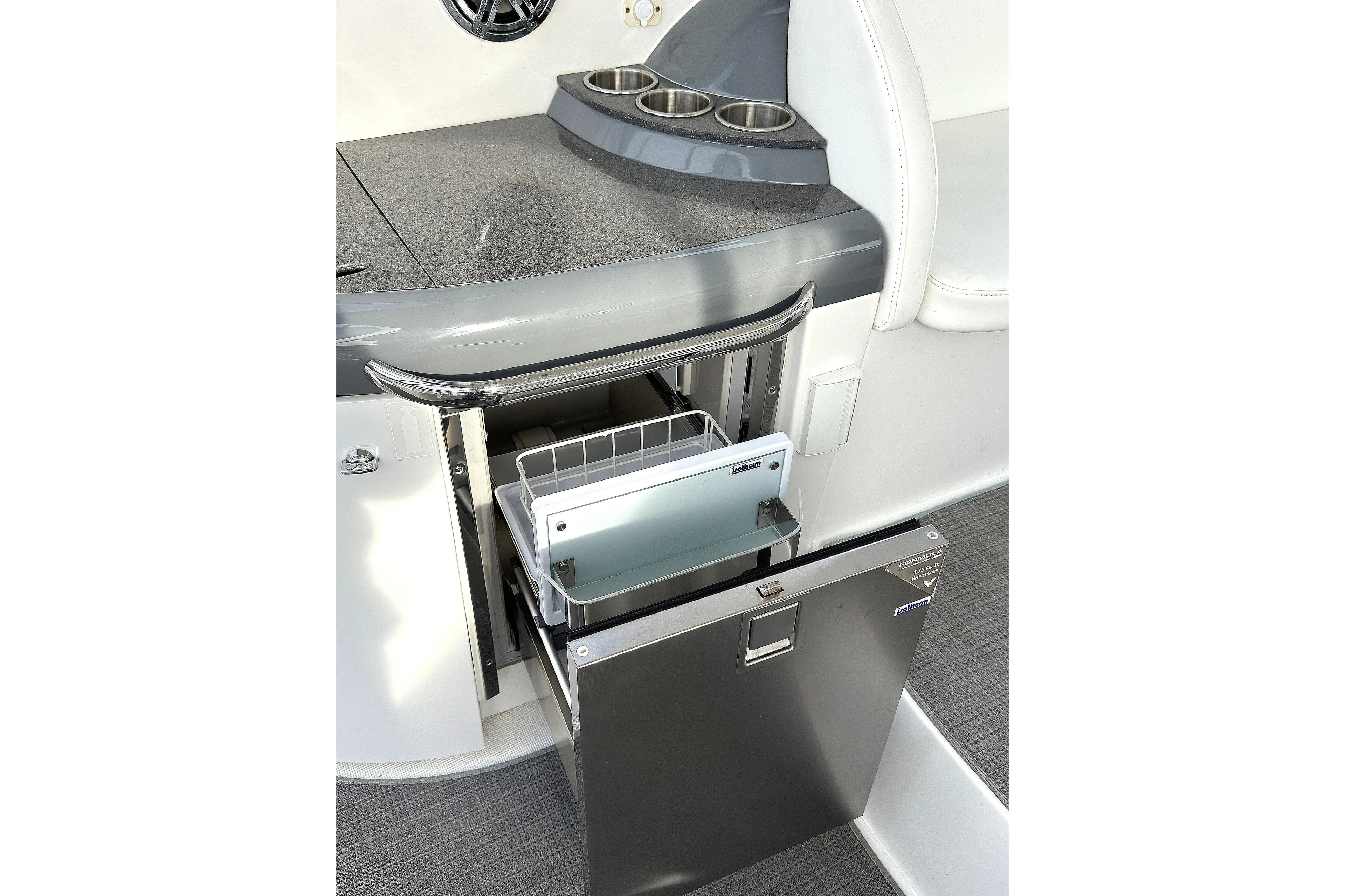 Blue Skye Yacht Photos Pics 2016 Formula 34 Performance Cruiser interior with open mini fridge and cup holders.