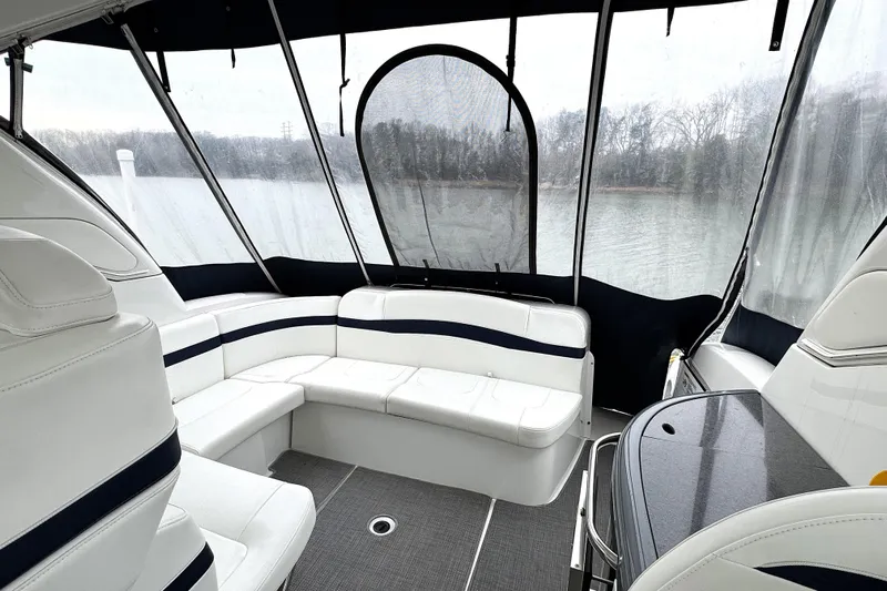 Blue Skye Yacht Photos Pics Interior of 2016 Formula 34 Performance Cruiser with white seating and panoramic windows.