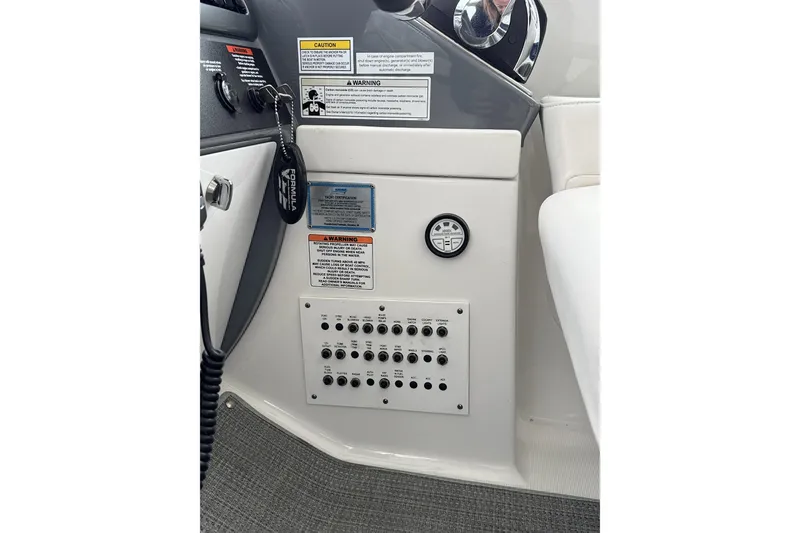 Blue Skye Yacht Photos Pics Control panel of 2016 Formula 34 Performance Cruiser with switches and warnings.