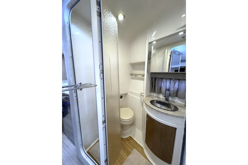 Blue Skye Yacht Photos Pics 2016 Formula 34 Performance Cruiser bathroom with modern fixtures and compact design.