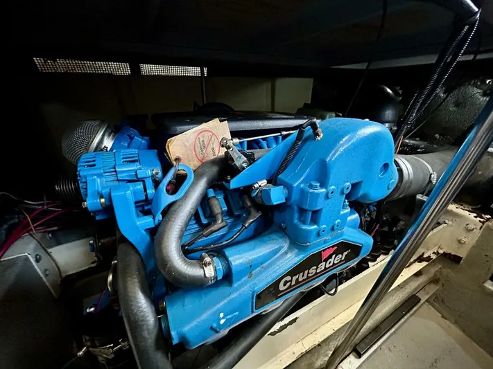  Yacht Photos Pics Engine of a 2001 Silverton 410 Sport Bridge, featuring a blue Crusader motor.