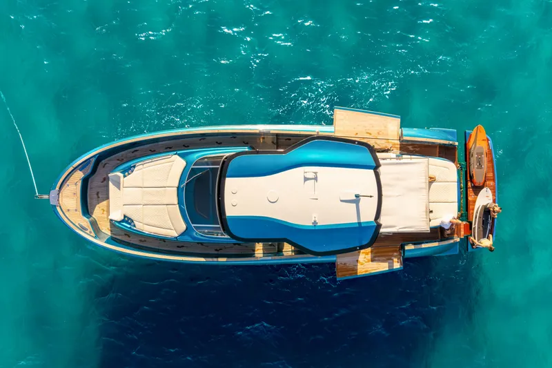  Yacht Photos Pics Top view of 2024 Solaris Power 52 Open yacht on turquoise water.