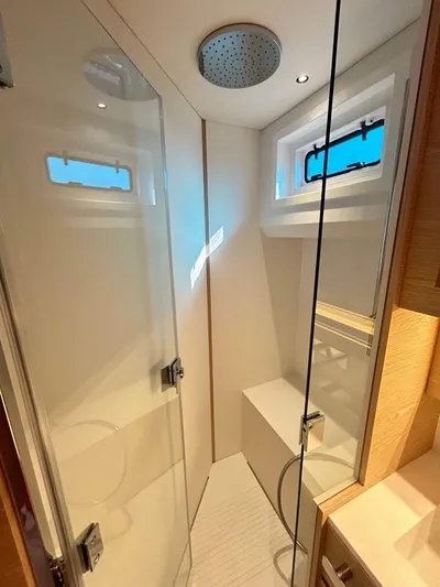  Yacht Photos Pics 2024 Solaris Power 52 Open yacht bathroom with modern shower and sleek design.