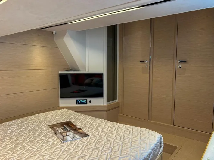  Yacht Photos Pics Luxurious cabin interior of 2024 Solaris Power 52 Open yacht with modern amenities.