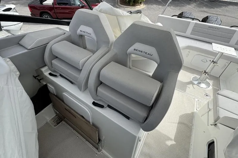  Yacht Photos Pics 2024 Beneteau Flyer 10 boat interior with plush seating and modern design.